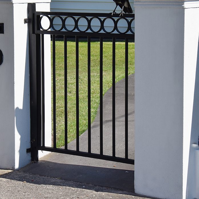 brick,pillar,luxury,front,fence,with,circular,wrought,iron,features